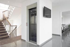 TV a/nebo společenská místnost v ubytování Hotel Cantoria