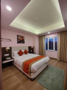 Postel nebo postele na pokoji v ubytování Hotel Krishna Kathmandu