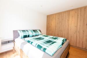 Postel nebo postele na pokoji v ubytování Ferienwohnung Pedit