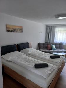 Letto o letti in una camera di Gästehaus Friedl