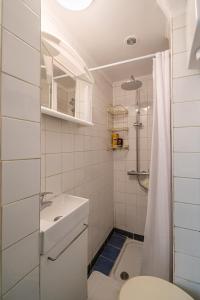 Et badeværelse på Appartement Ivry