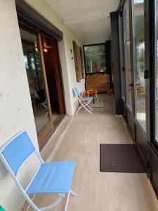 Televízia a/alebo spoločenská miestnosť v ubytovaní Chalet- Capacité 8/10 pers au cœur de la station