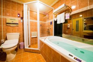Vannituba majutusasutuses Wen Sha Bao Motel-Xinying