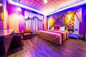 Voodi või voodid majutusasutuse Wen Sha Bao Motel-Xinying toas
