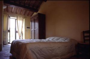 La Casa Nova tesisinde bir odada yatak veya yataklar