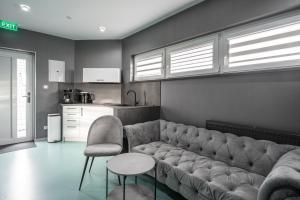 Η κουζίνα ή μικρή κουζίνα στο OŽA apartmány