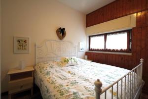 Appartamento dei Laghi tesisinde bir odada yatak veya yataklar
