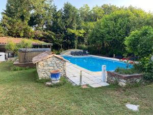 The swimming pool at or close to GITE CLARIMOR