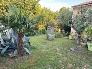 A garden outside GITE CLARIMOR