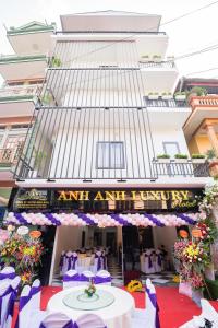 an entrance to an event venue with purple and purple decorations at Anh Anh Luxury Hotel in Tuyên Quang