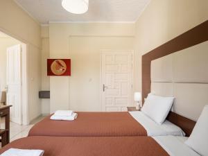Postel nebo postele na pokoji v ubytování Sofia Apartments