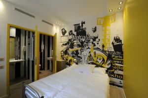 Cama o camas de una habitación en The 3 Ducks Eiffel Tower by Hiphophostels