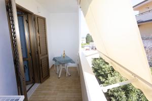 A balcony or terrace at B&B L'Oasi