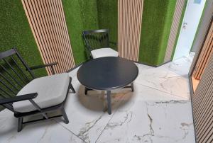 Posezení v ubytování Ljubljana Capsule Hostel