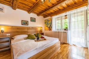 Posteľ alebo postele v izbe v ubytovaní B&B Plitvica Lodge