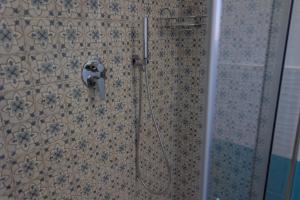 A bathroom at B&B L'Oasi