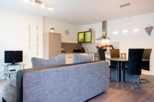 TV a/nebo společenská místnost v ubytování Ferienwohnung Epting
