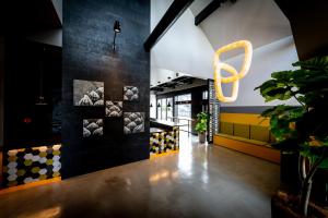 a lobby of a restaurant with a sign on the wall at The Villa & Barrel Lounge in Shizuoka