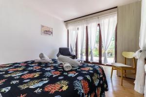 Postel nebo postele na pokoji v ubytování Apartments Vera Savic