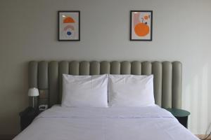 Postel nebo postele na pokoji v ubytování Hotel Seogwipean