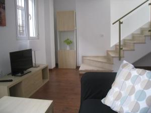Televízia a/alebo spoločenská miestnosť v ubytovaní Málaga Apartamentos - Pozos Dulces, 22