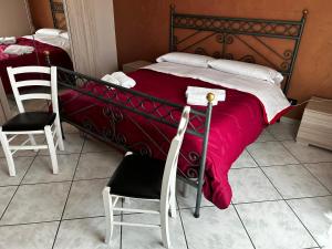 Postel nebo postele na pokoji v ubytování Grotta del Monaco