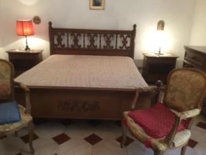 A bed or beds in a room at Scicli Amore Mio