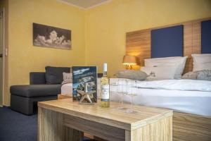 Nápoje v ubytování HOTEL DÜNENLÄUFER Carolinensiel