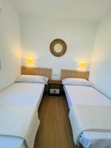 Posteľ alebo postele v izbe v ubytovaní Apartamento Deluxe Torremar