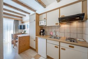 Kuchyň nebo kuchyňský kout v ubytování Landhaus Edelweiss
