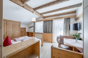 Postel nebo postele na pokoji v ubytování Landhaus Edelweiss