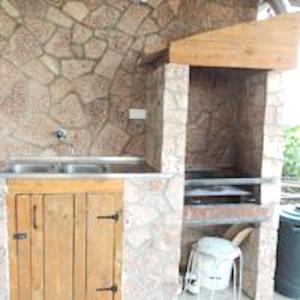 a kitchen with a sink and a counter top at Sea View Apartment Ulcinj 80 m² in Ulcinj