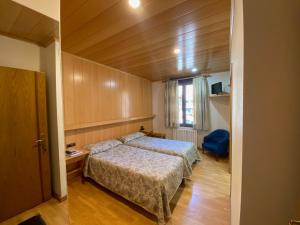 Postel nebo postele na pokoji v ubytování Hotel Sant Antoni