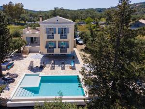 an aerial view of a house with a swimming pool at A Casa D' Irene Gaios Paxos in Gaios