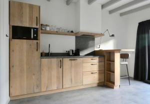 A cozinha ou cozinha compacta de Gerrit's Guesthouse Grou