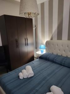 Postel nebo postele na pokoji v ubytování cico appartamento