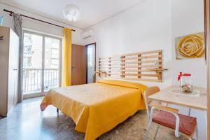 Ένα ή περισσότερα κρεβάτια σε δωμάτιο στο Casa Bella