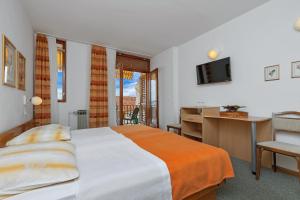 Postel nebo postele na pokoji v ubytování Haus Anne Brela