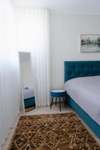 Postel nebo postele na pokoji v ubytování Vesiroosi Apartments - Apartment 1