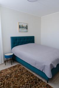 Postel nebo postele na pokoji v ubytování Vesiroosi Apartments - Apartment 1