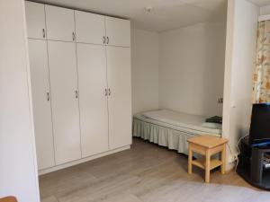 Tempat tidur dalam kamar di Marent Apartments
