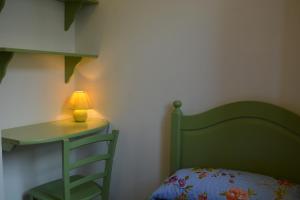 Cama ou camas em um quarto em Vacanze Morfino