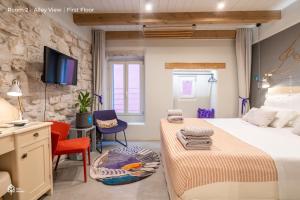 Postel nebo postele na pokoji v ubytování Casa Amando Eco Boutique House
