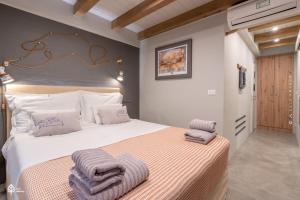 Postel nebo postele na pokoji v ubytování Casa Amando Eco Boutique House