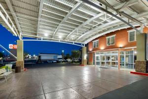 an empty parking lot in front of a building at Best Western Plus Henderson Hotel in Las Vegas