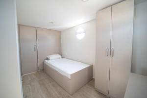 Postel nebo postele na pokoji v ubytování Moda Beach Hotel