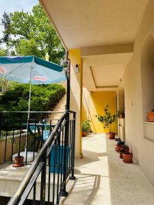 En balkong eller terrass på Villa Mari Guest Rooms