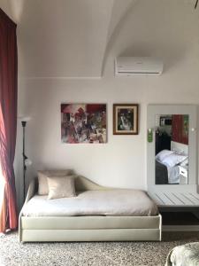 Postel nebo postele na pokoji v ubytování B&B dai Mimmi