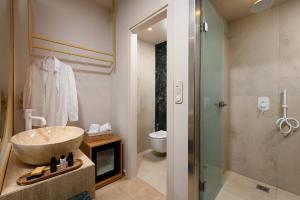 Ванная комната в Hotel Villa Natassa