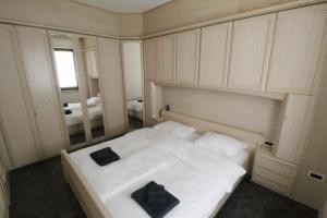 Ένα ή περισσότερα κρεβάτια σε δωμάτιο στο Villa Danica